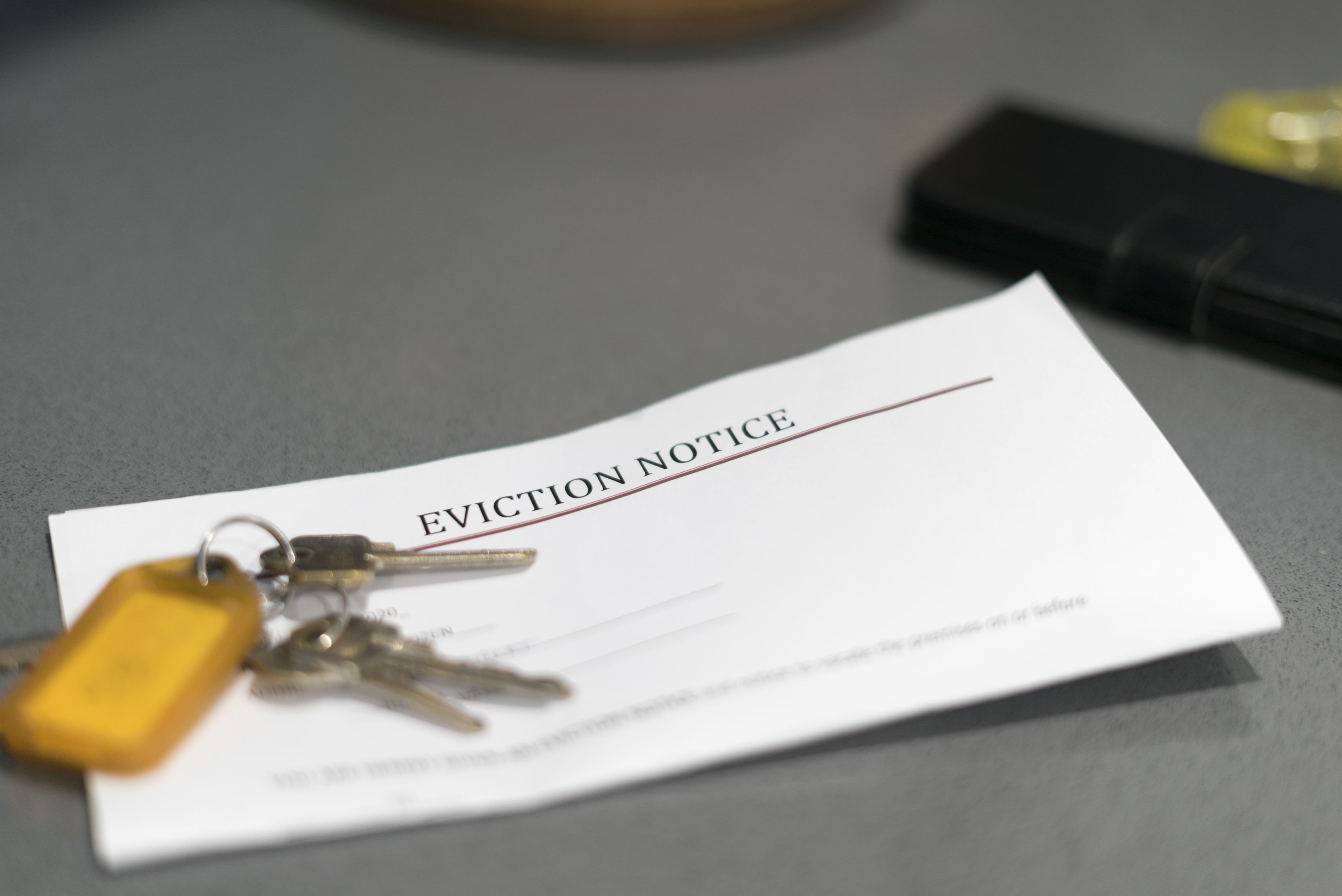 an eviction notice with house keys