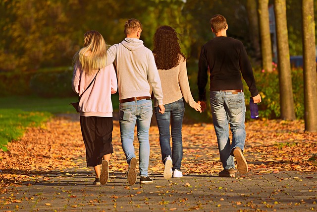 four people on a walk in fall